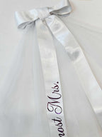 Closeup of customised text on bridal veil