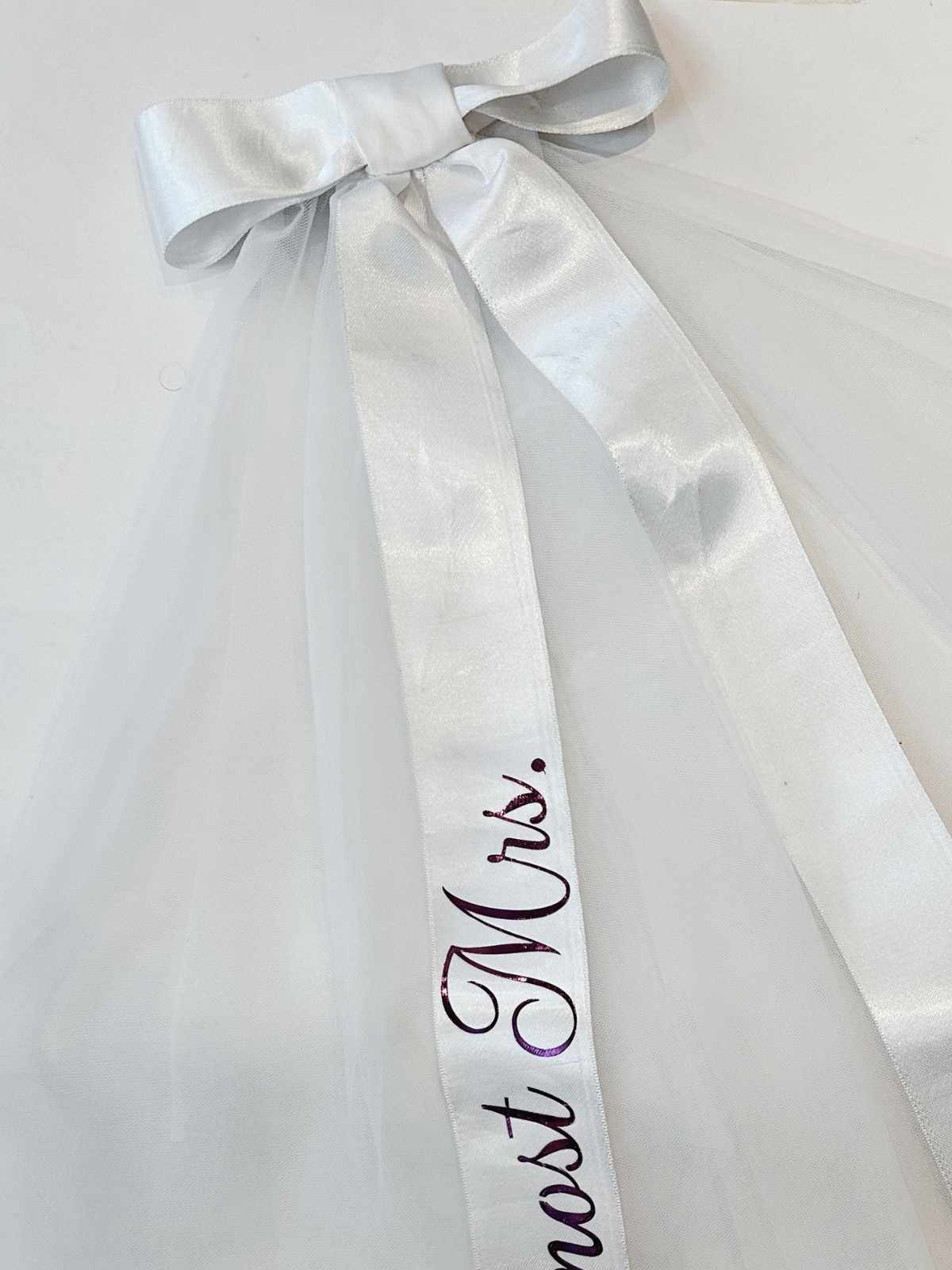 Closeup of customised text on bridal veil