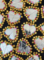 Heart embroidered mirror clips with ghungroos. 