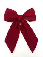 Red bow on a white background