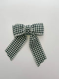 houndstooth bow on white surface by loveknots