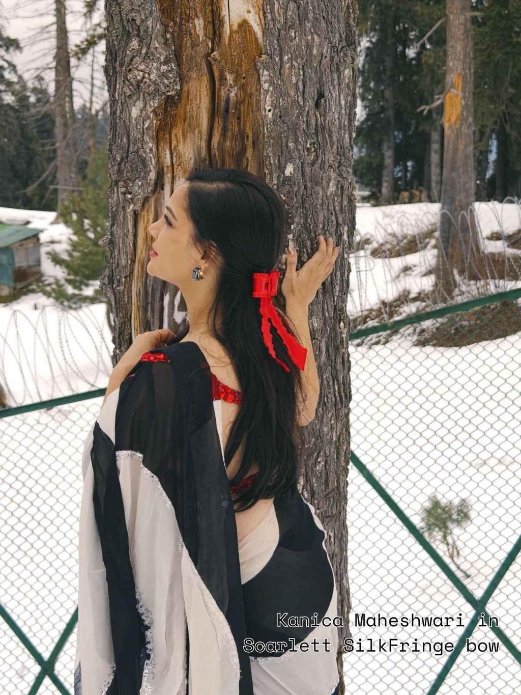 Celebrity kanica Maheshwari showing backside wearing Scarlett silk fringe bow in a saree in Kashmir holiday by loveknots
