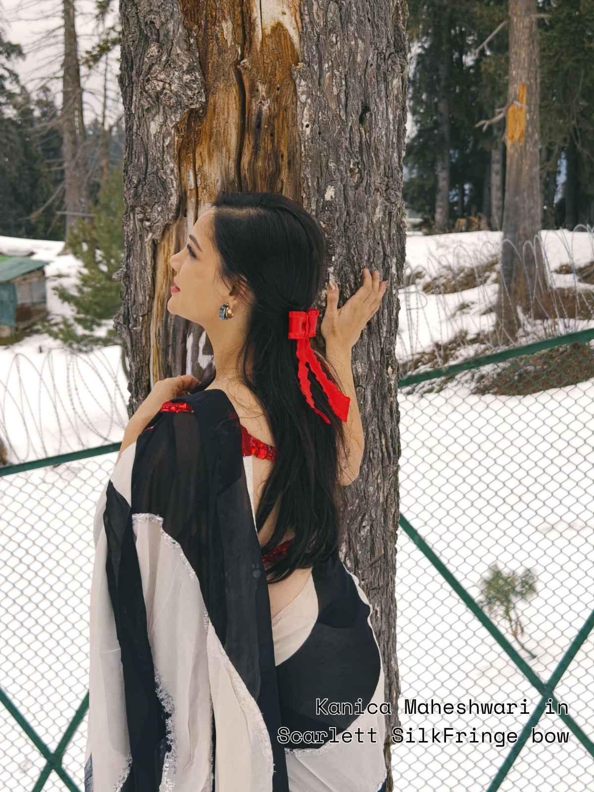 Celebrity kanica Maheshwari showing backside wearing Scarlett silk fringe bow in a saree in Kashmir holiday by loveknots