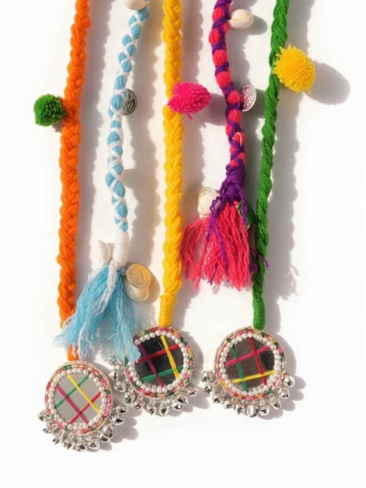 closeup of dandiya prnadi with mirrors and ghungroos