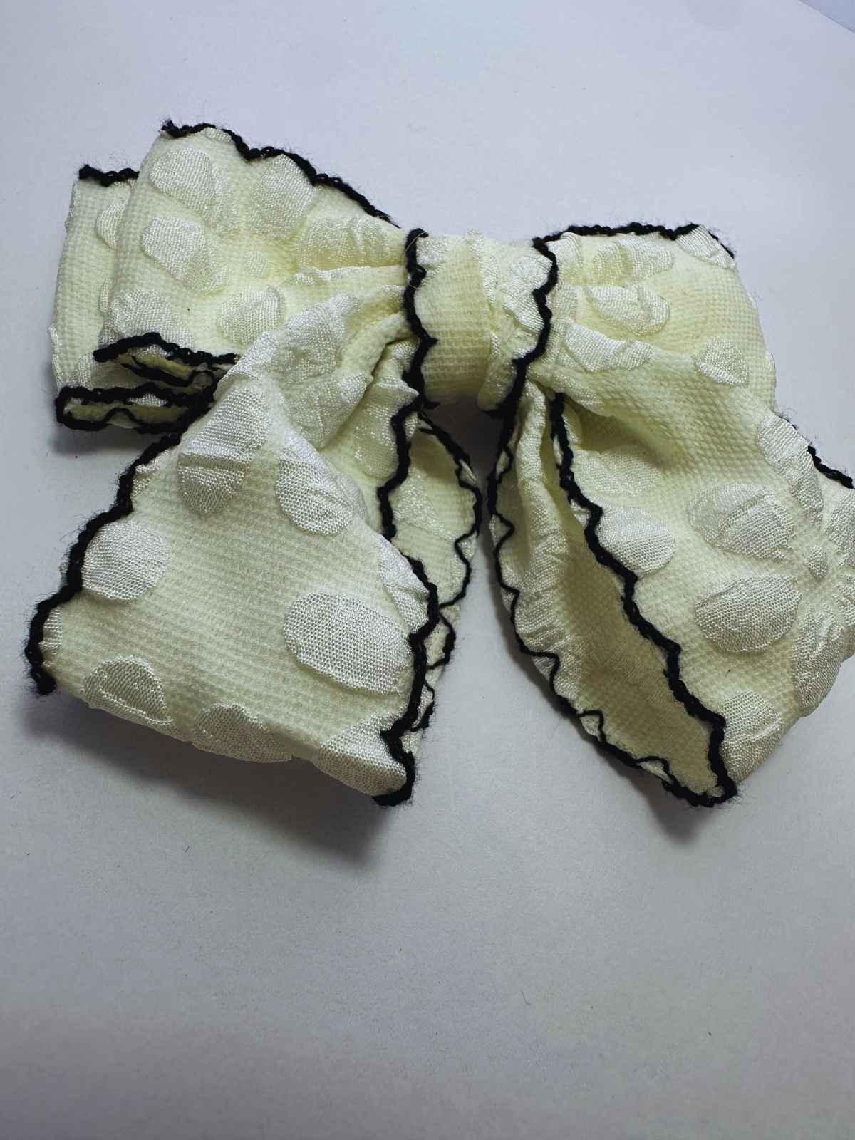 white scalloped cheer bow by loveknots