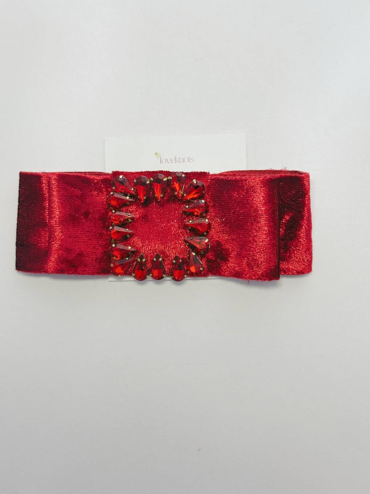 closeup of red velvet Victoria bow by loveknots