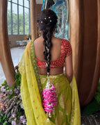 women wearing gulnoor parandi roses in hair