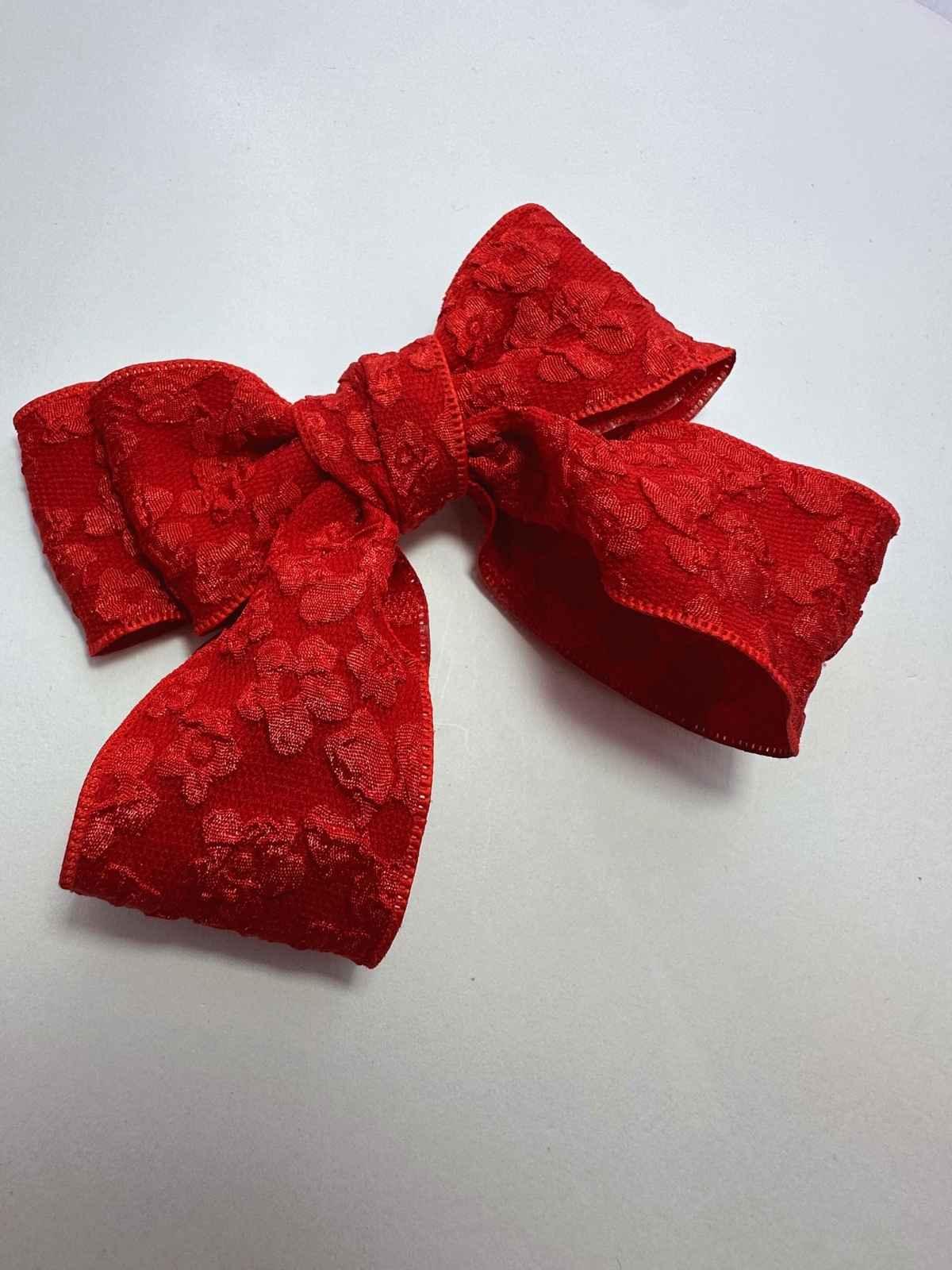 red scalloped cheer bow by loveknots