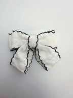white scalloped cheer bow by loveknots