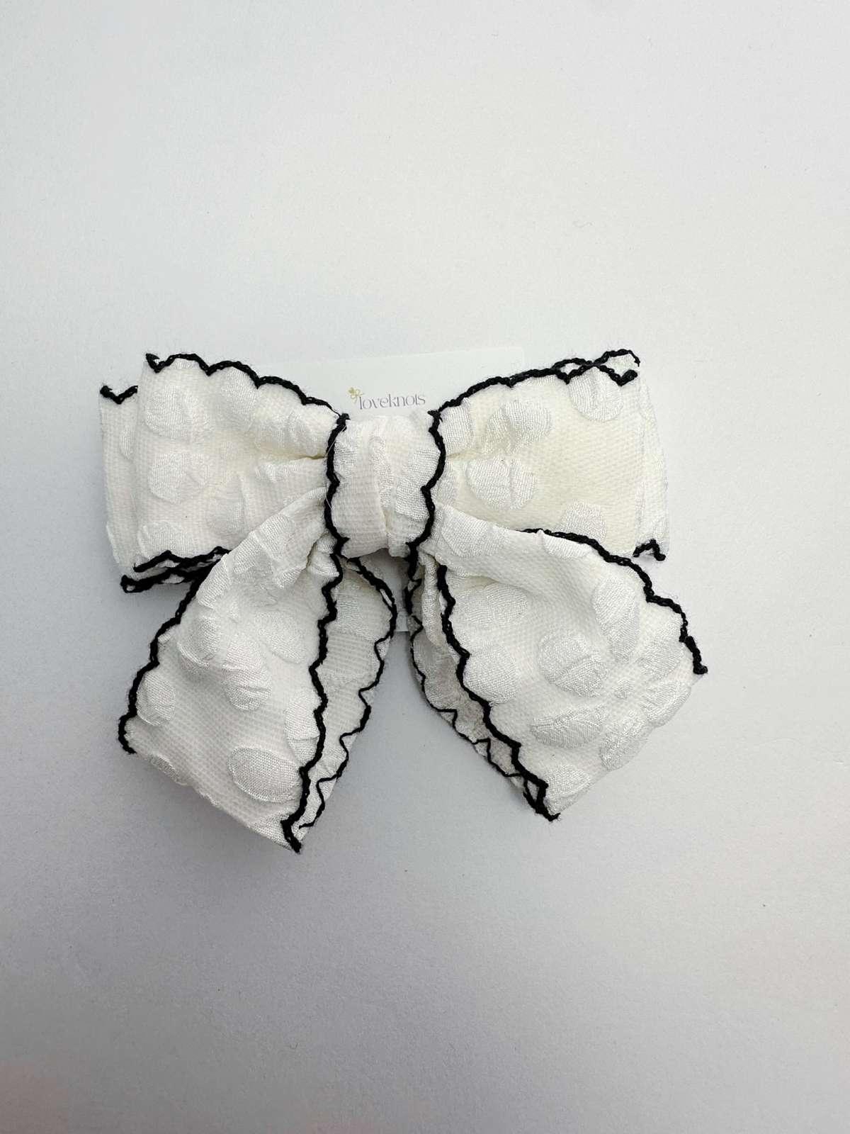 white scalloped cheer bow by loveknots